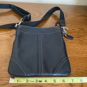 Coach black with white stitching crossbody bag